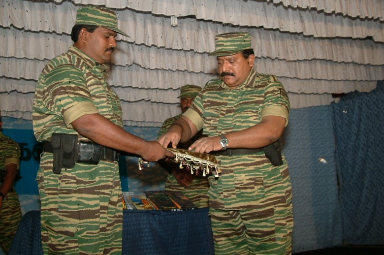 Col. Soosai, Special Commander of the Sea Tigers hands over the first copy of the music album